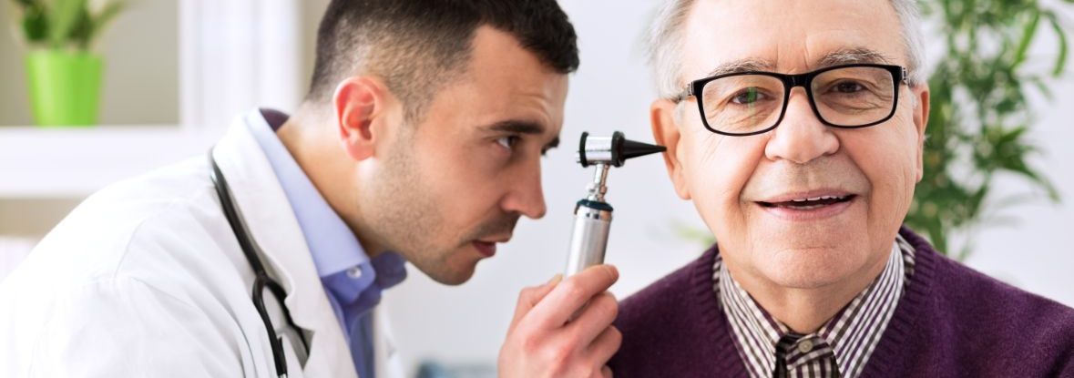 A senior man is examined during a doctor’s visit.