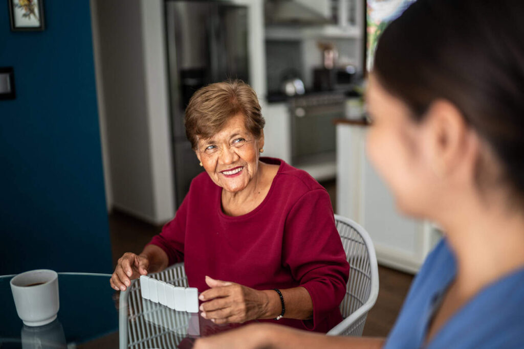 senior at kitchen table
