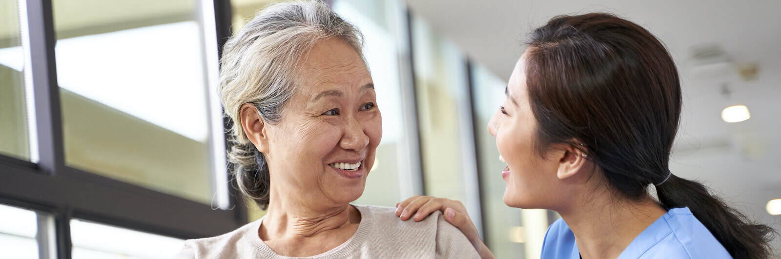Friendly caregiver with a patient