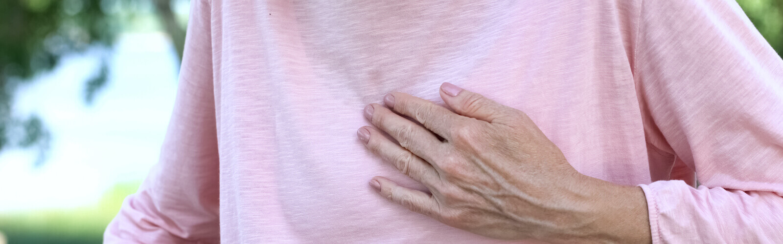 senior woman suffering heart issues