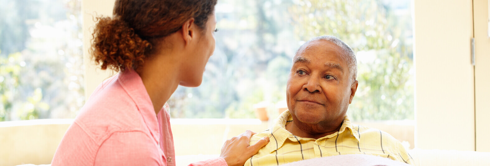 Woman looking after sick father